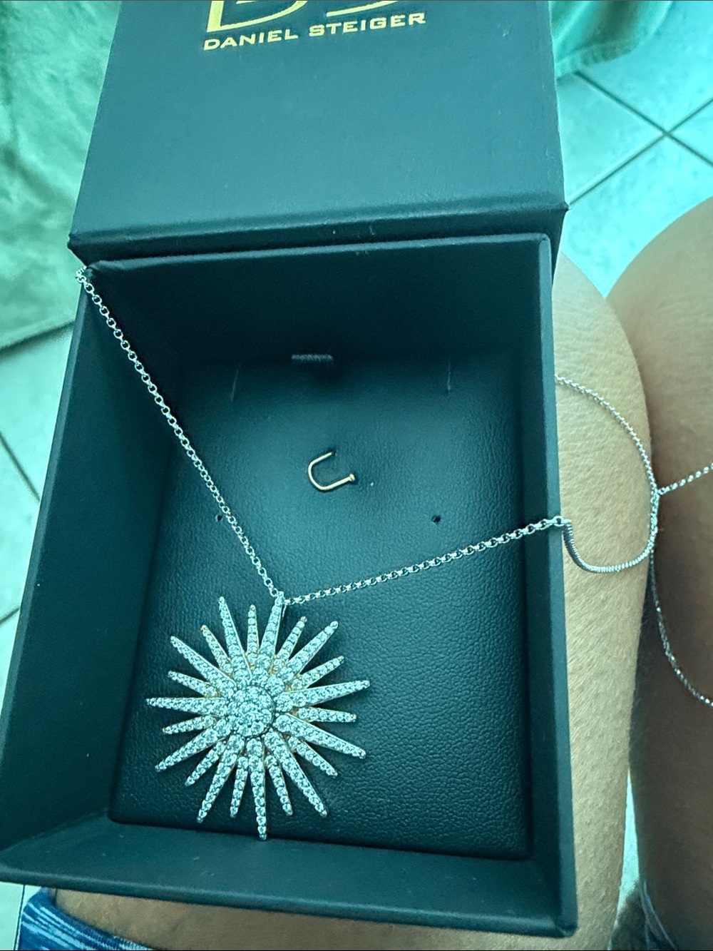 Silver Sunburst Pendant Necklace with Cubic Zirconia